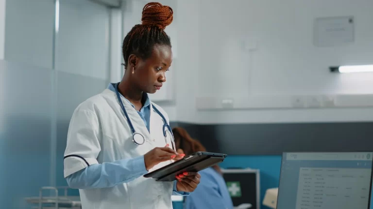 medic-looking-tablet-screen-healthcare-system_482257-26740